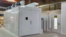 Load image into Gallery viewer, Prime Heat HalCon 18 ft Standard – HalCon Batch Tunnel IR curing oven next to a spray booth