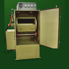 Load image into Gallery viewer, Clemco ZERO BNP 162 tumble barrel blast cabinet with the door open showing the rubber-lined barrel and drive wheels (BNP-164 shown)