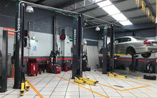 Load image into Gallery viewer, BendPak XPR-10AS-LP Screw Pads Adjustable Width Asymmetric Clearfloor 10,000-lb. Capacity Two-Post Lift